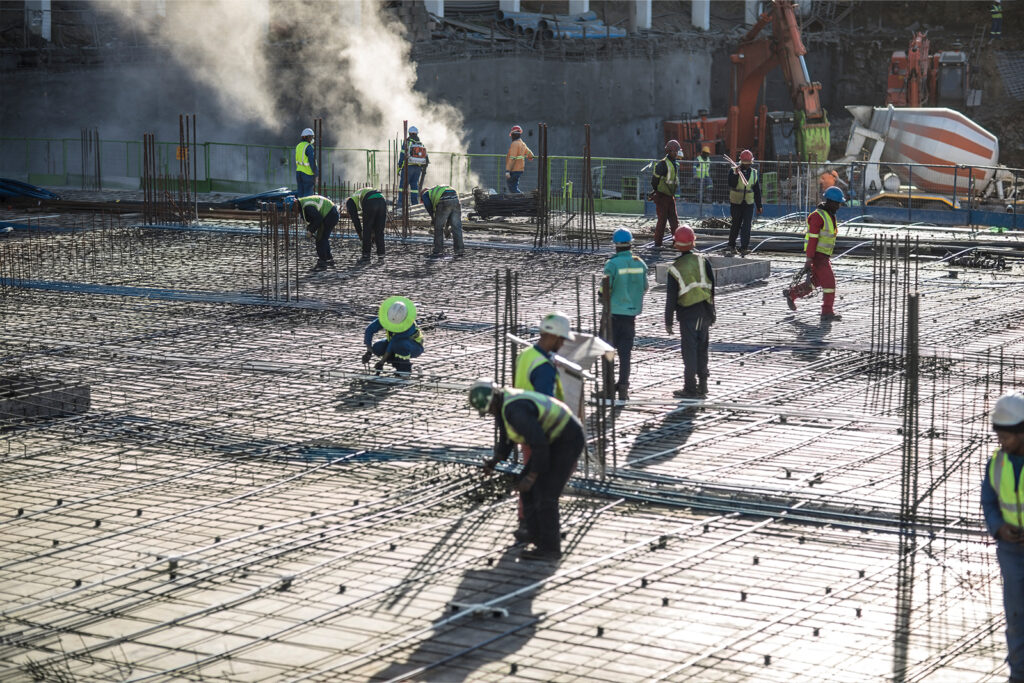 Construction Workers Laying a Concrete Slab