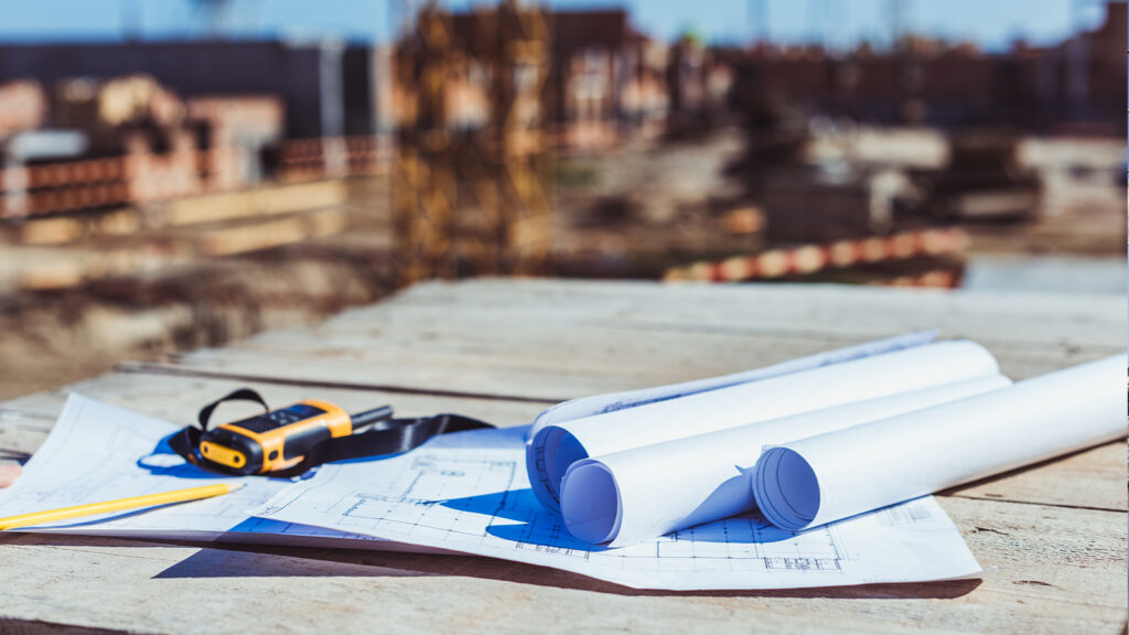 Plans at a warehouse construction site